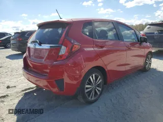 2015 Honda Fit EX-L with VIN 3HGGK5H83FM771673, listed as a Copart auction lot 76297004 with 186,736 mi miles and Salvage Title. Bid and sale history available at DreamBid. Image 3.