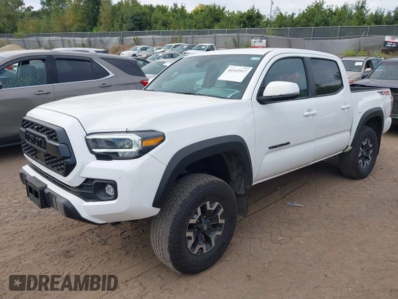 2023 Toyota Tacoma SR z VIN 3TMCZ5AN1PM637609, wystawiony jako IAAI lot #40345917 z przebiegiem 12 614 mil mil oraz . Historia ofert i sprzedaży dostępna na DreamBid. Obrazek 22.