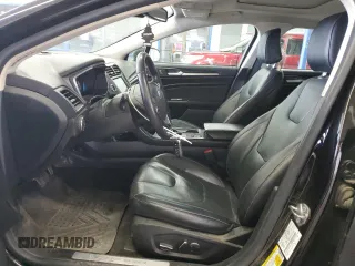 2020 Ford Fusion Titanium with VIN 3FA6P0RUXLR182408, listed as a Copart auction lot 56897105 with 100,021 mi miles and Salvage title. Bid and sale history available at DreamBid. Image 7.