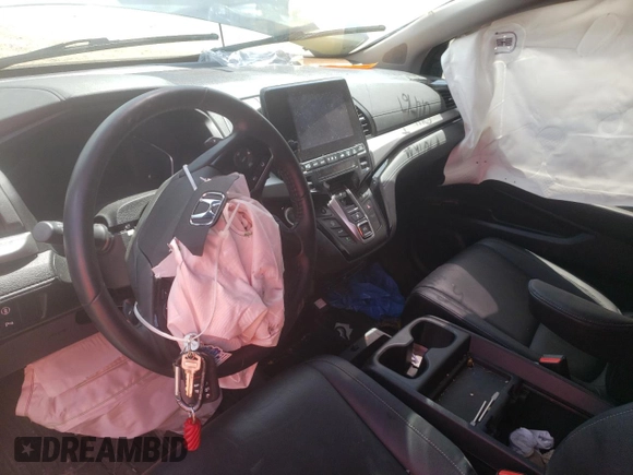 2024 Honda Odyssey Touring with VIN 5FNRL6H84RB014767, listed as a Copart auction lot 57070935 with Not provided miles and Salvage title. Bid and sale history available at DreamBid. Image 8.