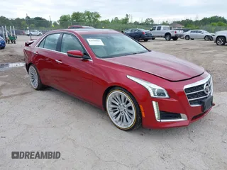2014 Cadillac CTS Luxury AWD with VIN 1G6AX5SX2E0132873, listed as a IAAI auction lot 42560903 with 124,347 mi miles and . Bid and sale history available at DreamBid. Image 1.