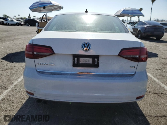 2017 Volkswagen Jetta SEL with VIN 3VWL17AJ3HM297202, listed as a Copart auction lot 57959785 with 113,408 mi miles and Salvage title. Bid and sale history available at DreamBid. Image 6.