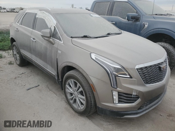 2022 Cadillac XT5 FWD Premium Luxury z VIN 1GYKNCRS1NZ126722, wystawiony jako Copart lot #87977755 z przebiegiem Nie podano mil oraz Nie do naprawy • Non repairable. Historia ofert i sprzedaży dostępna na DreamBid. Obrazek 4.
