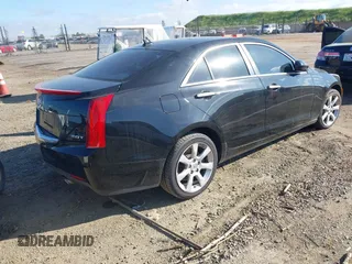 2013 Cadillac ATS z VIN 1G6AG5RX8D0160407, wystawiony jako IAAI lot #41872957 z przebiegiem 159 840 mil mil oraz . Historia ofert i sprzedaży dostępna na DreamBid. Obrazek 4.