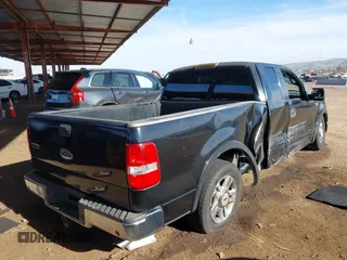 2005 Ford F-150 XLT with VIN 1FTPX12525NB25391, listed as a IAAI auction lot 41588721 with 241,743 mi miles. Bid and sale history available at carsss.com. Image 4.