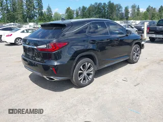 2016 Lexus RX 350 with VIN 2T2BZMCA9GC046531, listed as a IAAI auction lot 42704126 with 103,928 mi miles and . Bid and sale history available at DreamBid. Image 4.