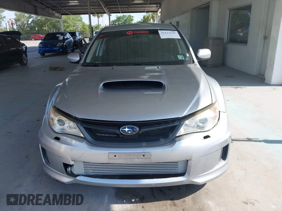 2013 Subaru Impreza Sedan WRX WRX with VIN JF1GV7E60DG014909, listed as a IAAI auction lot 42127645 with 70,360 mi miles. Bid and sale history available at carsss.com. Image 12.