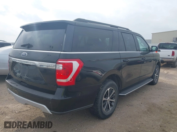 2021 Ford Expedition Max XLT with VIN 1FMJK1JT0MEA18953, listed as a IAAI auction lot 41801066 with 89,986 mi miles and . Bid and sale history available at DreamBid. Image 4.