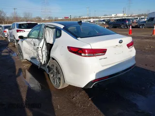 2016 Kia Optima SX Turbo with VIN 5XXGW4L29GG037932, listed as a IAAI auction lot 41800068 with 16,387 mi miles and . Bid and sale history available at carsss.com. Image 3.