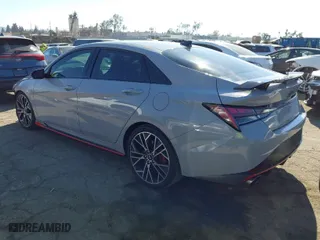2022 Hyundai Elantra N with VIN KMHLW4AK8NU006711, listed as a IAAI auction lot 41885577 with 15,735 mi miles. Bid and sale history available at carsss.com. Image 3.