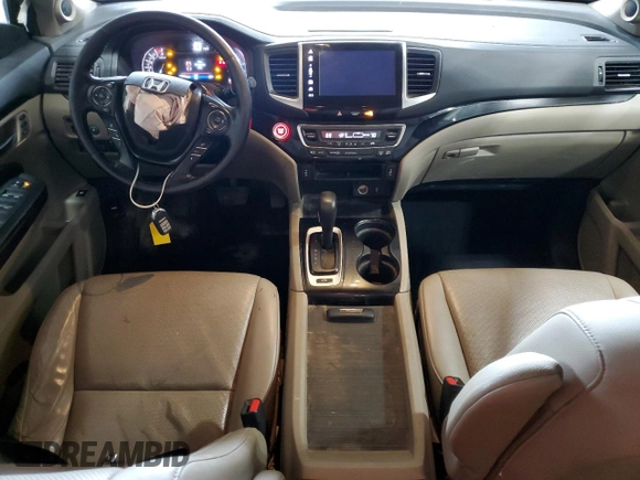 2017 Honda Ridgeline RTL-E with VIN 5FPYK3F72HB002890, listed as a Copart auction lot 57699735 with 128,813 mi miles and Salvage title. Bid and sale history available at DreamBid. Image 8.