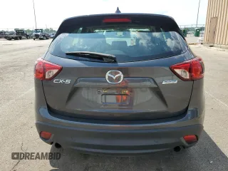 2016 Mazda CX-5 Sport z VIN JM3KE2BY4G0632946, wystawiony jako Copart lot #61447435 z przebiegiem 178 492 mil mil oraz Szkoda całkowita • Salvage title. Historia ofert i sprzedaży dostępna na DreamBid. Obrazek 6.
