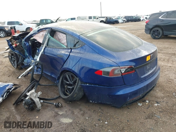 2021 Tesla Model S Long Range with VIN 5YJSA1E50MF432224, listed as a IAAI auction lot 41417130 with Not provided miles and . Bid and sale history available at DreamBid. Image 3.