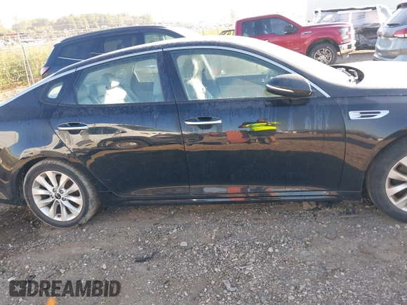 2016 Kia Optima EX with VIN 5XXGU4L39GG054891, listed as a IAAI auction lot 40325310 with 112,457 mi miles and . Bid and sale history available at DreamBid. Image 13.