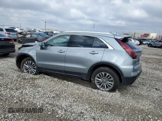 2024 Cadillac XT4 AWD Premium Luxury with VIN 1GYFZDR40RF123637, listed as a Copart auction lot 46852195 with 5,001 mi miles and Salvage title. Bid and sale history available at DreamBid. Image 2.