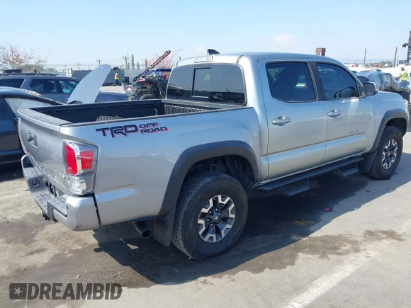 2020 Toyota Tacoma SR5 with VIN 3TMAZ5CN7LM138859, listed as a IAAI auction lot 42150725 with 36,462 mi miles and . Bid and sale history available at DreamBid. Image 4.