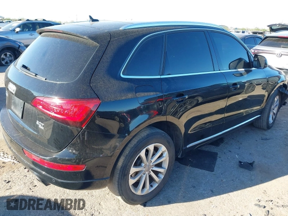 2014 Audi Q5 Premium Plus z VIN WA1LFAFP9EA130988, wystawiony jako IAAI lot #41835596 z przebiegiem 91 303 mil mil oraz . Historia ofert i sprzedaży dostępna na DreamBid. Obrazek 4.