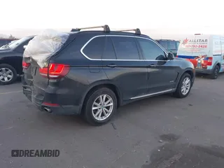 2015 BMW X5 xDrive35i with VIN 5UXKR0C59F0K59728, listed as a IAAI auction lot 41701083 with 83,267 mi miles. Bid and sale history available at carsss.com. Image 4.