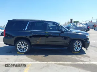 2016 Chevrolet Tahoe LT z VIN 1GNSCBKC7GR311313, wystawiony jako IAAI lot #42303467 z przebiegiem 90 889 mil mil oraz . Historia ofert i sprzedaży dostępna na DreamBid. Obrazek 14.