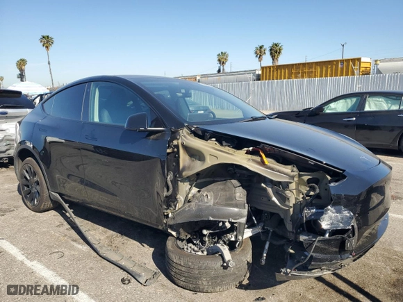 2023 Tesla Model Y Long Range with VIN 7SAYGDEE8PA025847, listed as a Copart auction lot 52580225 with 0 mi miles and Salvage Title. Bid and sale history available at carsss.com. Image 4.