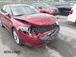 2013 Ford Taurus Limited with VIN 1FAHP2F84DG127859, listed as a IAAI auction lot 41913310 with 196,620 mi miles and . Bid and sale history available at DreamBid. Image 6.