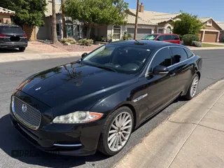 2012 Jaguar XJ with VIN SAJWA2GBXCLV24464, listed as a Copart auction lot 52572955 with 135,087 mi miles and Clean Title. Bid and sale history available at carsss.com. Image 2.