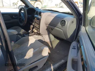 2005 GMC Envoy SLE z VIN 1GKDT13S852116252, wystawiony jako IAAI lot #42086929 z przebiegiem Nie podano mil oraz . Historia ofert i sprzedaży dostępna na DreamBid. Obrazek 5.