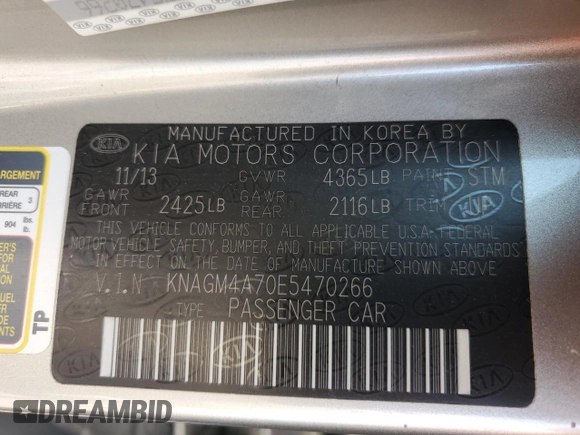 2014 Kia Optima LX with VIN KNAGM4A70E5470266, listed as a Copart auction lot 65084275 with 144,497 mi miles and Clean title. Bid and sale history available at DreamBid. Image 12.