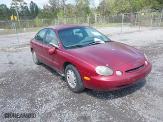 1997 Ford Taurus GL with VIN 1FALP52U7VA263051, listed as a IAAI auction lot 41940263 with 229,778 mi miles. Bid and sale history available at carsss.com. Image 1.