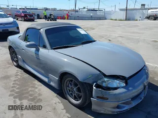 2003 Mazda MX-5 Miata Cloth with VIN JM1NB353930309670, listed as a IAAI auction lot 42234586 with 220,979 mi miles and . Bid and sale history available at DreamBid. Image 6.