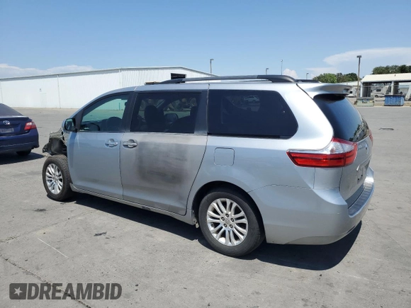 2015 Toyota Sienna XLE with VIN 5TDYK3DC4FS607026, listed as a Copart auction lot 60423605 with 132,327 mi miles and Clean title. Bid and sale history available at DreamBid. Image 2.