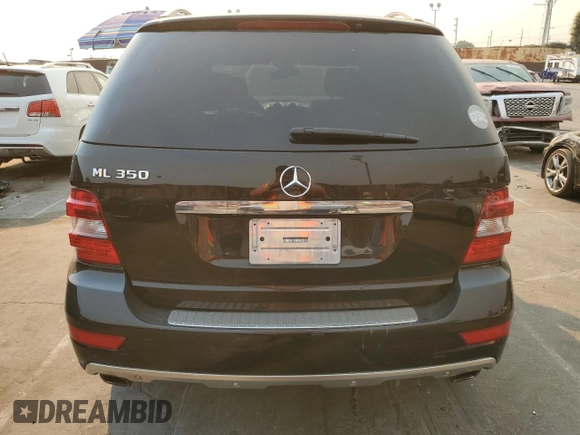 2009 Mercedes-Benz M 3.5L with VIN 4JGBB56E49A525018, listed as a Copart auction lot 41614175 with 154,428 mi miles and Salvage Title. Bid and sale history available at carsss.com. Image 6.