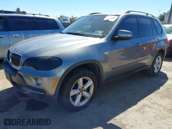 2008 BMW X5 3.0si with VIN 5UXFE43598L022453, listed as a IAAI auction lot 41852297 with 185,528 mi miles. Bid and sale history available at carsss.com. Image 2.