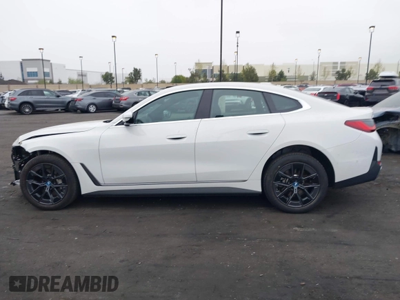 2024 BMW i4 eDrive35 z VIN WBY43AW09RFS24379, wystawiony jako IAAI lot #42014823 z przebiegiem 19 159 mil mil oraz . Historia ofert i sprzedaży dostępna na DreamBid. Obrazek 15.