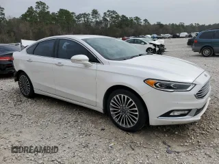 2017 Ford Fusion SE with VIN 3FA6P0H98HR175347, listed as a Copart auction lot 47828205 with 124,340 mi miles and Salvage Title. Bid and sale history available at DreamBid. Image 4.