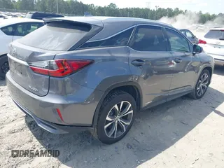 2016 Lexus RX 450h z VIN 2T2BGMCAXGC005914, wystawiony jako IAAI lot #42156530 z przebiegiem 94 050 mil mil oraz . Historia ofert i sprzedaży dostępna na DreamBid. Obrazek 4.
