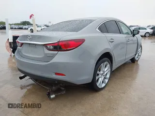 2016 Mazda 6 i Touring with VIN JM1GJ1V52G1463042, listed as a IAAI auction lot 42369747 with 136,849 mi miles and . Bid and sale history available at DreamBid. Image 4.
