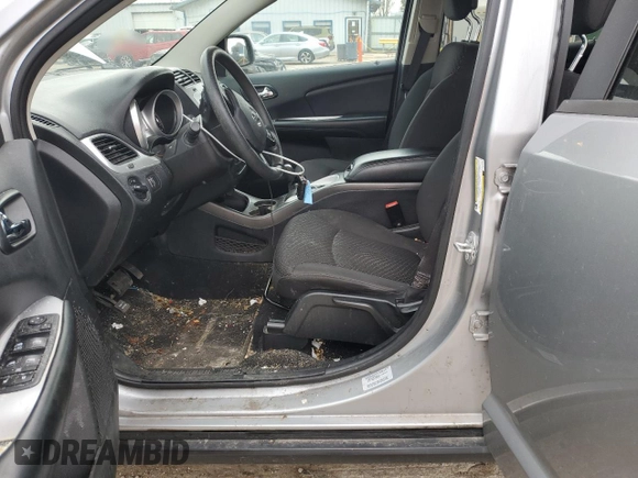 2017 Dodge Journey SE with VIN 3C4PDCAB9HT573188, listed as a Copart auction lot 51996425 with 121,978 mi miles and Salvage Title. Bid and sale history available at DreamBid. Image 7.