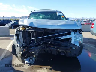 2013 Chevrolet Tahoe LT with VIN 1GNSKBE01DR157083, listed as a IAAI auction lot 41759189 with 153,403 mi miles and . Bid and sale history available at DreamBid. Image 6.