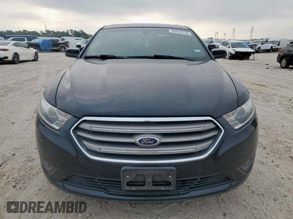 2014 Ford Taurus SEL z VIN 1FAHP2E84EG133955, wystawiony jako Copart lot #56630155 z przebiegiem 113 045 mil mil oraz Szkoda całkowita • Salvage title. Historia ofert i sprzedaży dostępna na DreamBid. Obrazek 5.