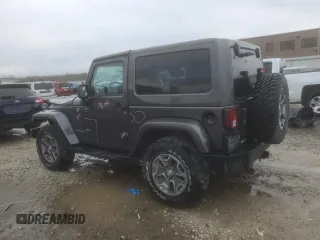 2014 Jeep Wrangler Rubicon with VIN 1C4BJWCG9EL189819, listed as a Copart auction lot 80522204 with 82,083 mi miles and Salvage title. Bid and sale history available at DreamBid. Image 2.