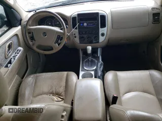 2007 Mercury Mariner with VIN 4M2CU39H97KJ03132, listed as a Copart auction lot 61134654 with 263,005 mi miles and Salvage title. Bid and sale history available at DreamBid. Image 8.