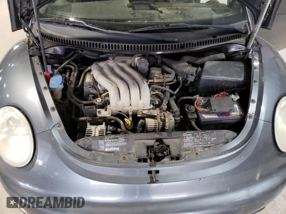 2003 Volkswagen New Beetle Coupe GLS with VIN 3VWCK21C33M436156, listed as a Copart auction lot 52589765 with 129,244 mi miles and Salvage Title. Bid and sale history available at carsss.com. Image 12.