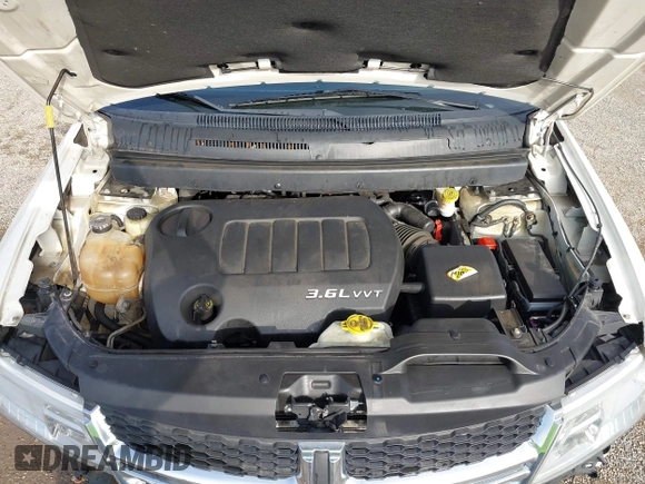 2013 Dodge Journey Crew with VIN 3C4PDCDG0DT591533, listed as a IAAI auction lot 42630548 with 164,961 mi miles and . Bid and sale history available at DreamBid. Image 10.