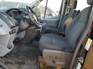 2018 Ford Transit Passenger XL with VIN 1FBVU4XG3JKA28907, listed as a Copart auction lot 69424444 with 61,411 mi miles and Salvage Title. Bid and sale history available at DreamBid. Image 7.