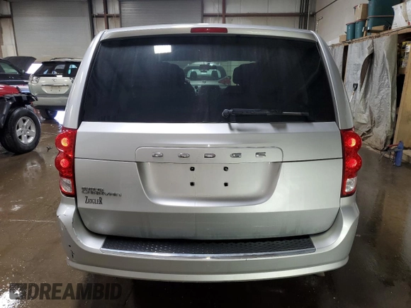 2012 Dodge Grand Caravan SE with VIN 2C4RDGBG5CR312016, listed as a Copart auction lot 52887255 with 96,355 mi miles and Salvage Title. Bid and sale history available at DreamBid. Image 6.