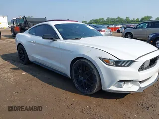 2015 Ford Mustang EcoBoost with VIN 1FA6P8TH4F5318890, listed as a IAAI auction lot 42427160 with 52,051 mi miles and . Bid and sale history available at DreamBid. Image 1.