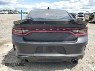 2015 Dodge Charger RT with VIN 2C3CDXCT9FH784672, listed as a Copart auction lot 58190615 with 121,033 mi miles and Salvage title. Bid and sale history available at DreamBid. Image 6.