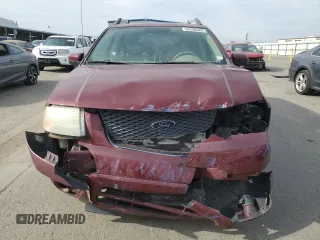 2005 Ford Freestyle Limited with VIN 1FMZK06165GA74986, listed as a Copart auction lot 53398485 with 148,459 mi miles and Salvage title. Bid and sale history available at DreamBid. Image 5.