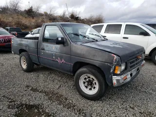 1991 Nissan Frontier with VIN 1N6SD11S9MC419923, listed as a Copart auction lot 85189314 with 245,003 mi miles and Salvage title. Bid and sale history available at DreamBid. Image 4.